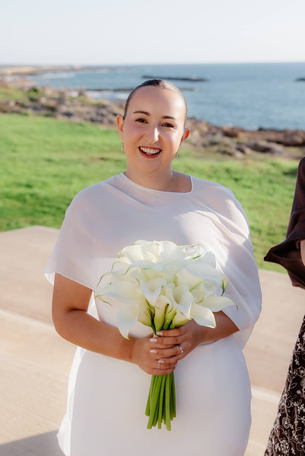 Christos & Eleni, the bride with her calla lilies