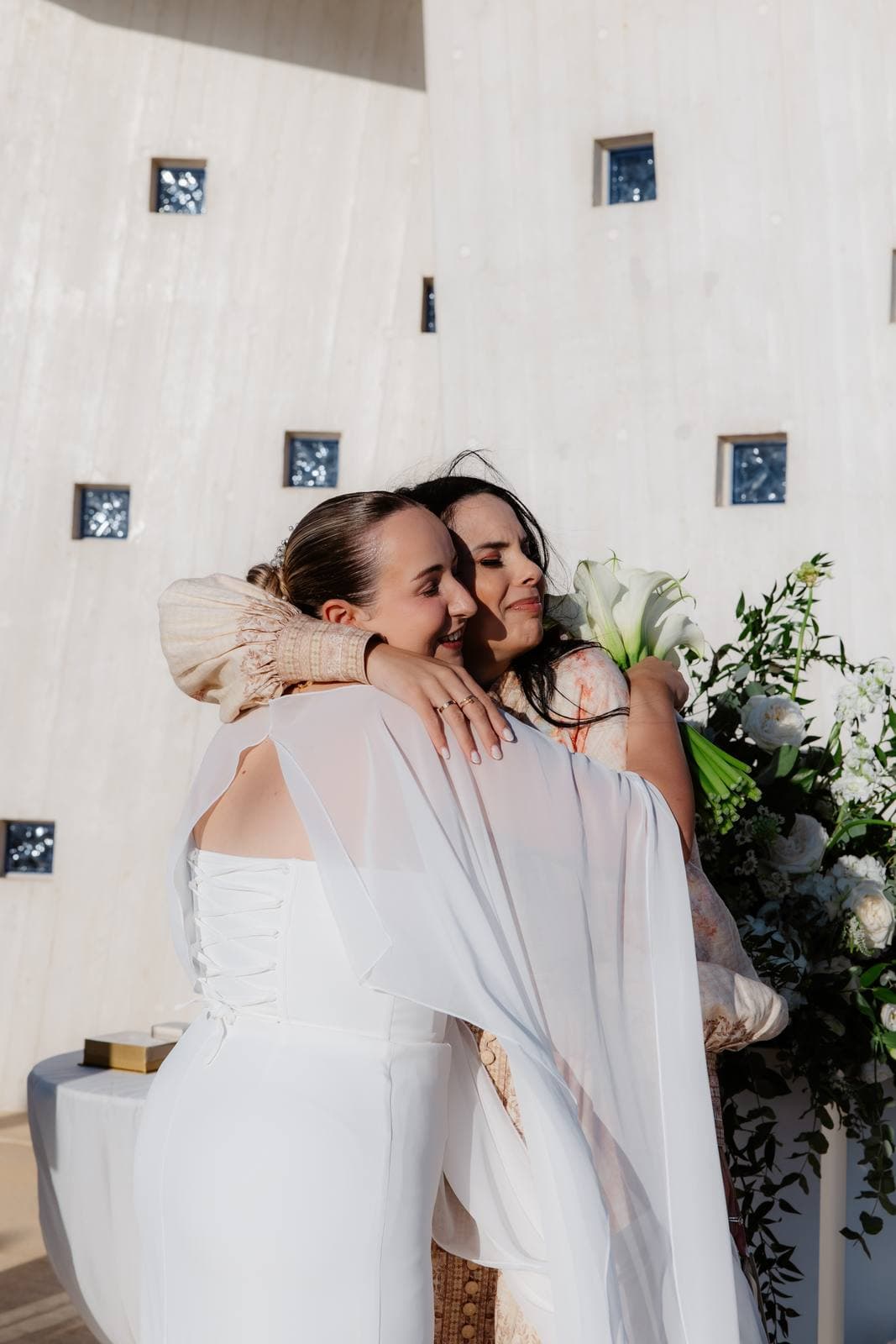 Christos & Eleni, a hug after the ceremony