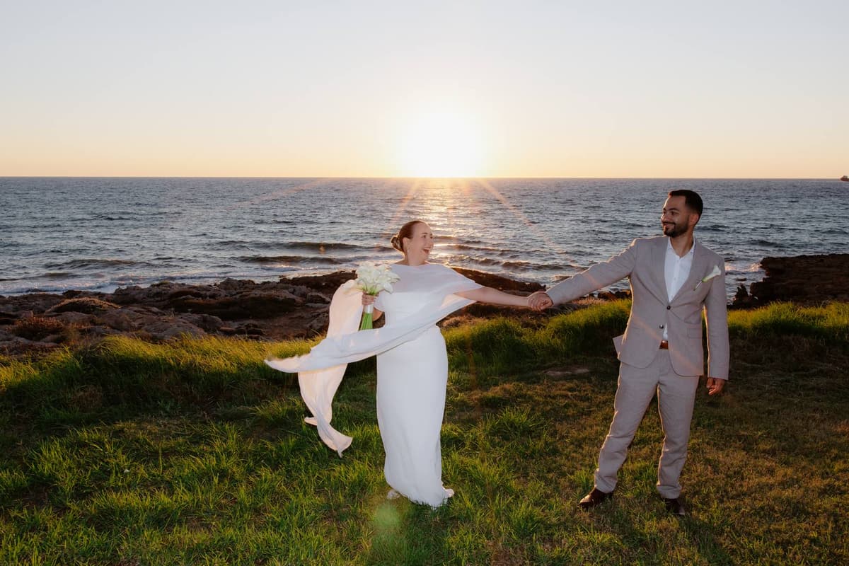 Christos & Eleni, bride and groom on the coast at sunset