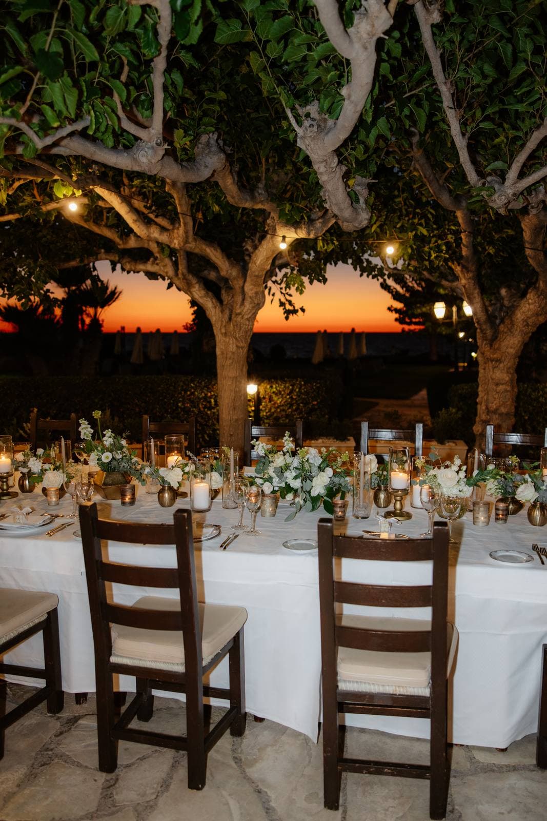 Christos & Eleni, the long tables at dusk at Elysium