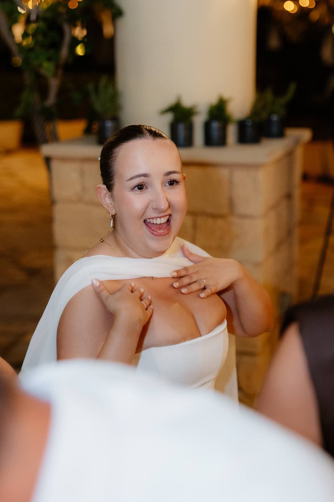 Christos & Eleni, the bride laughing on the dance floor