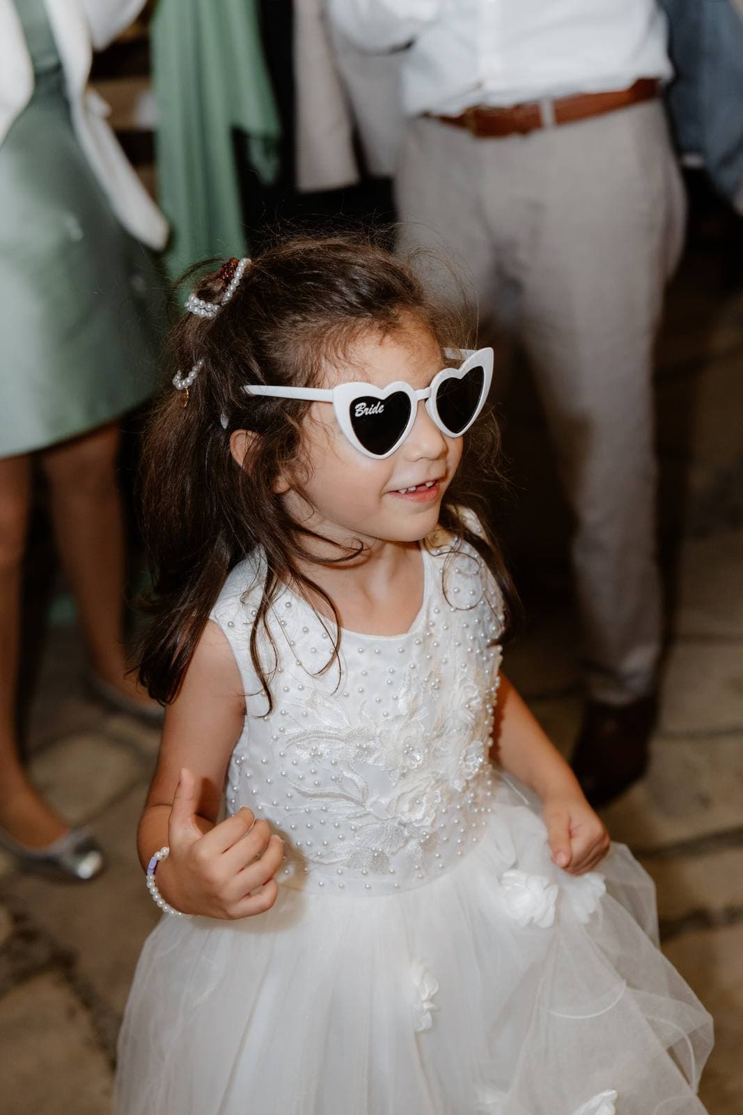 Christos & Eleni, the flower girl in heart sunglasses