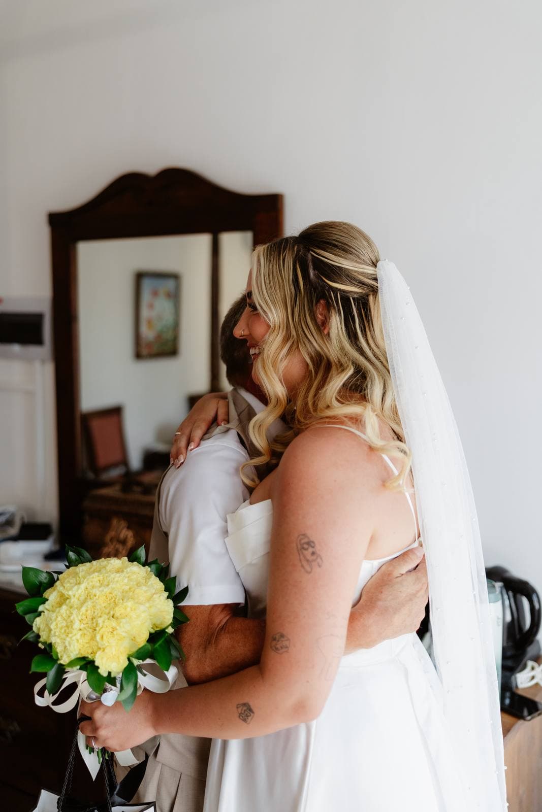 Hannah & Danial, the bride with her bouquet before the ceremony