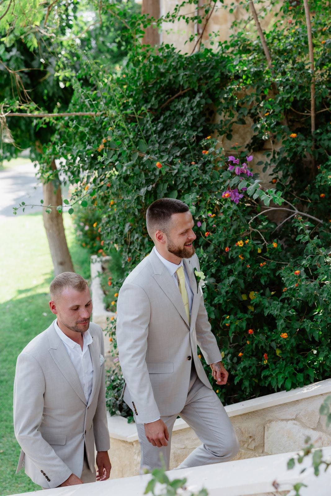Hannah & Danial, the groom walking up to the garden