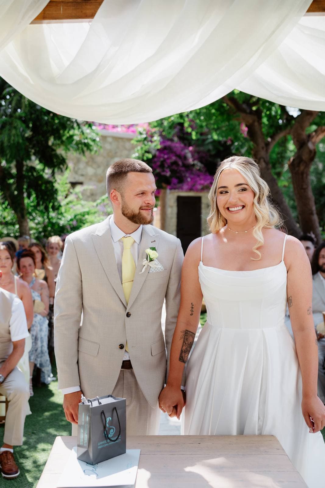 Hannah & Danial, bride and groom at the ceremony table