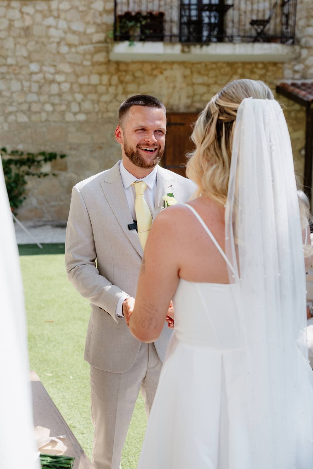 Hannah & Danial, laughing during the vows