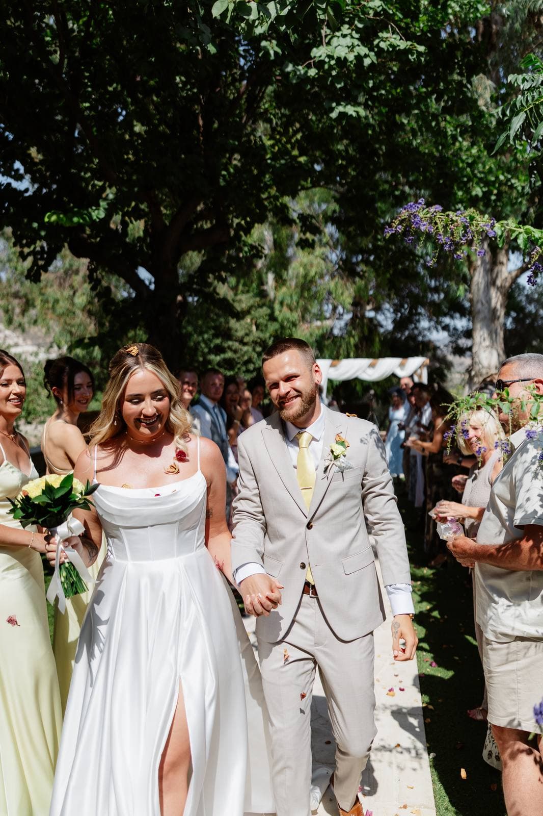Hannah & Danial, bride and groom leaving the ceremony