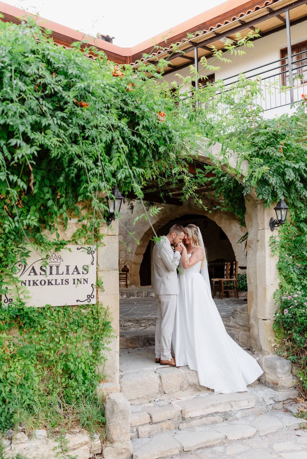 Hannah & Danial, at the entrance of Vasilias Nikoklis Inn