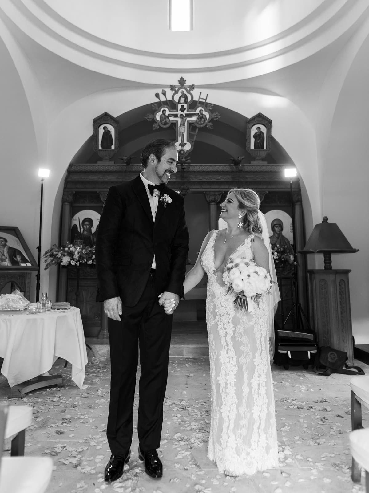 The couple at the altar of the Anassa chapel