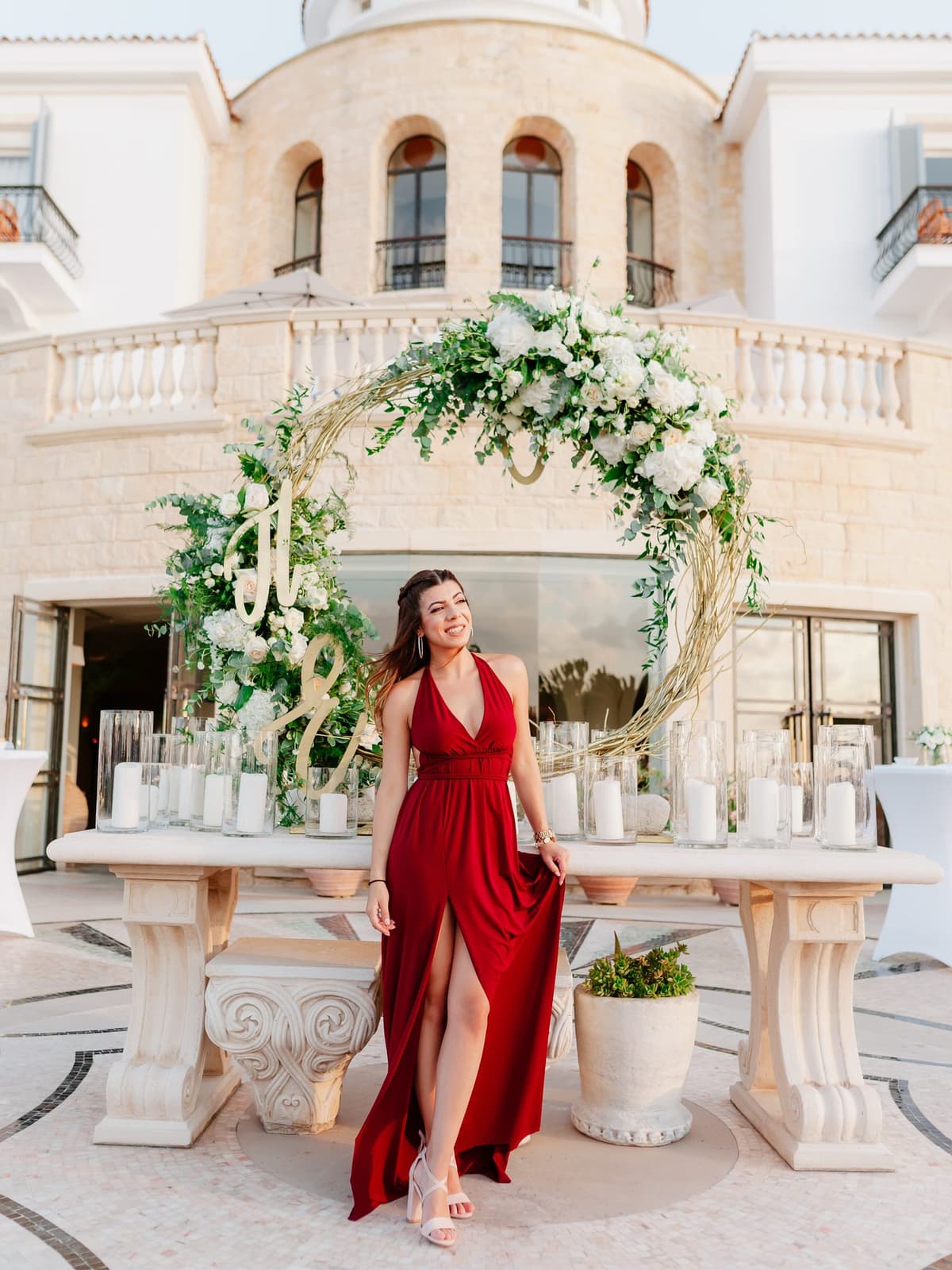 A guest by the floral arch