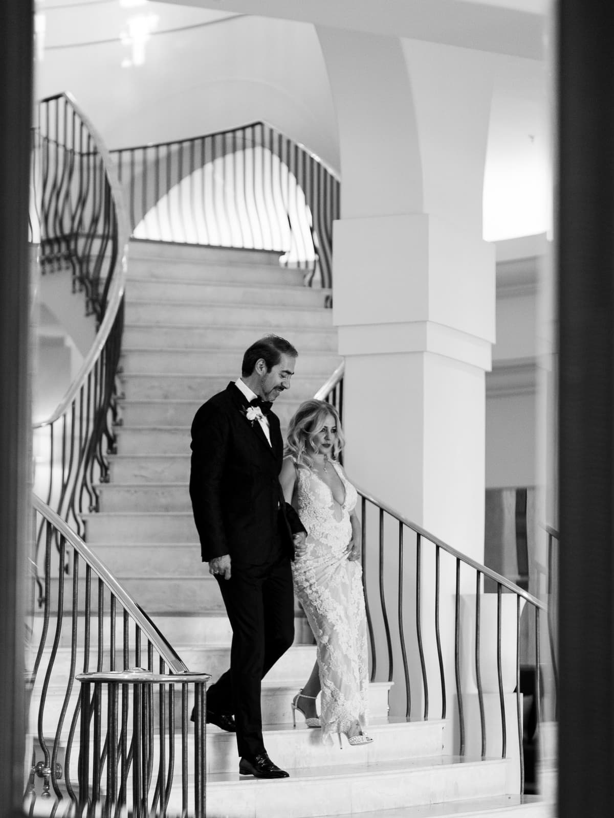 The couple on the white staircase