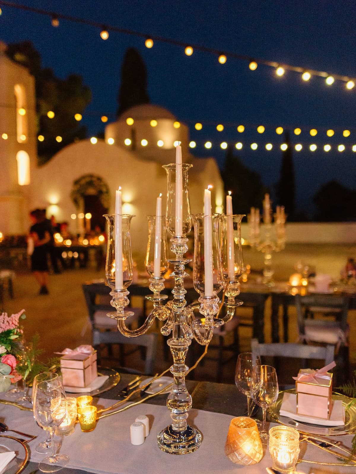Candelabra and lights at the evening reception