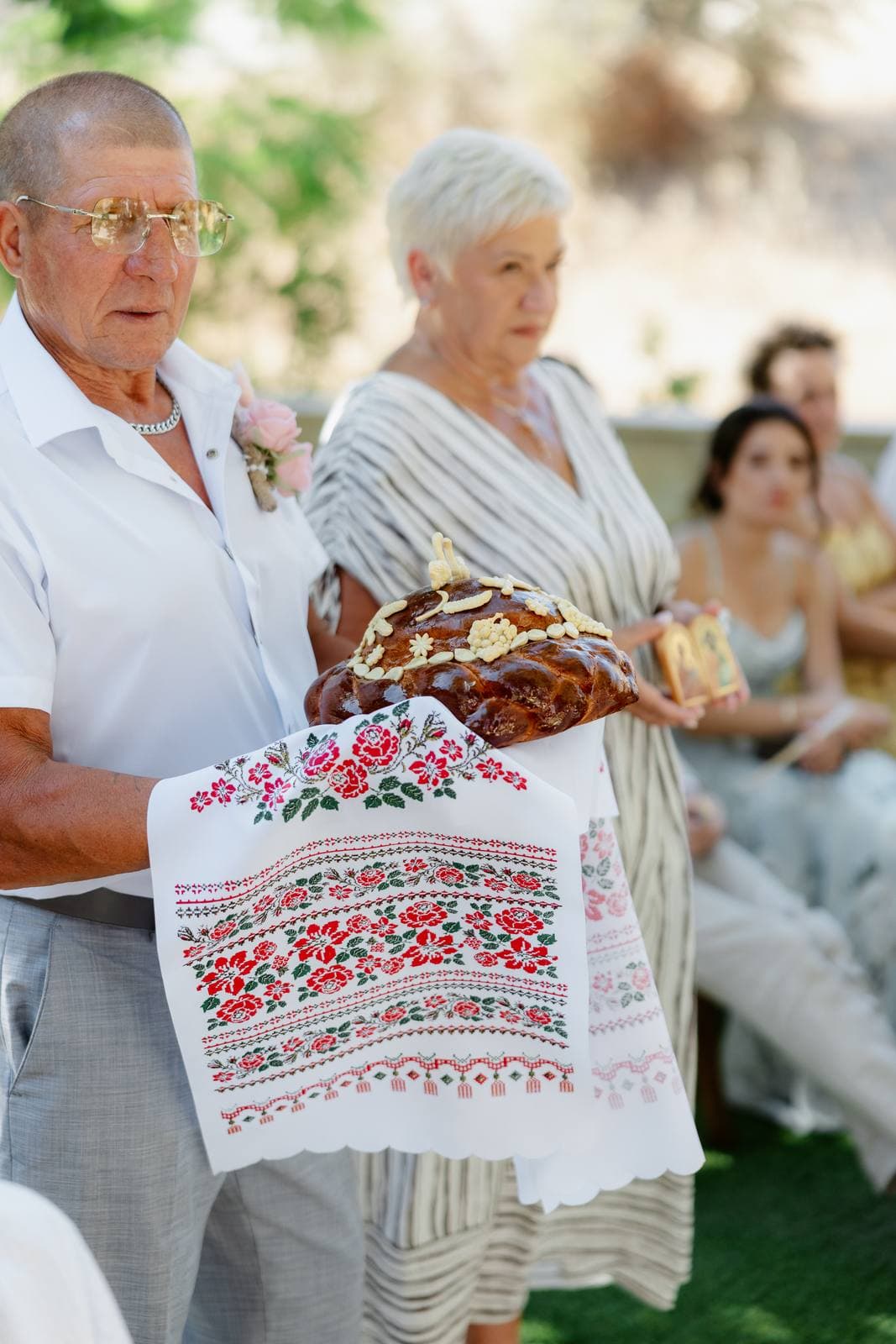Rita & Andrej, the family blessing with bread and an embroidered towel