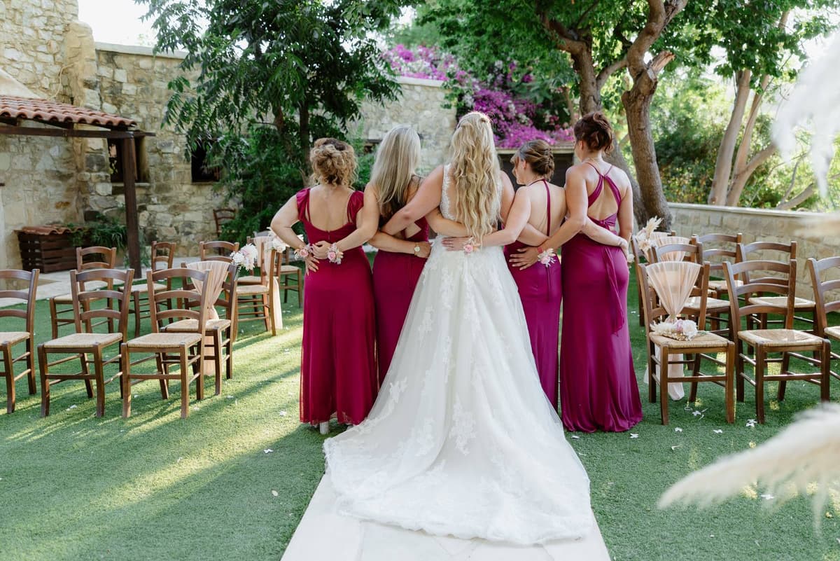 Rita & Andrej, the bride and bridesmaids from behind