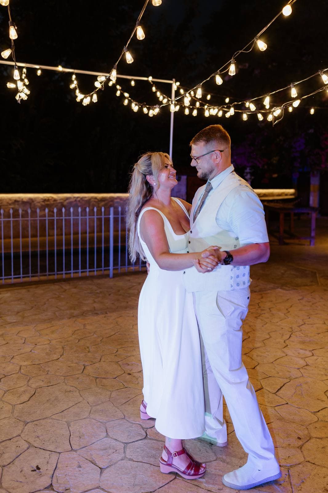 Rita & Andrej, the first dance under the festoon lights