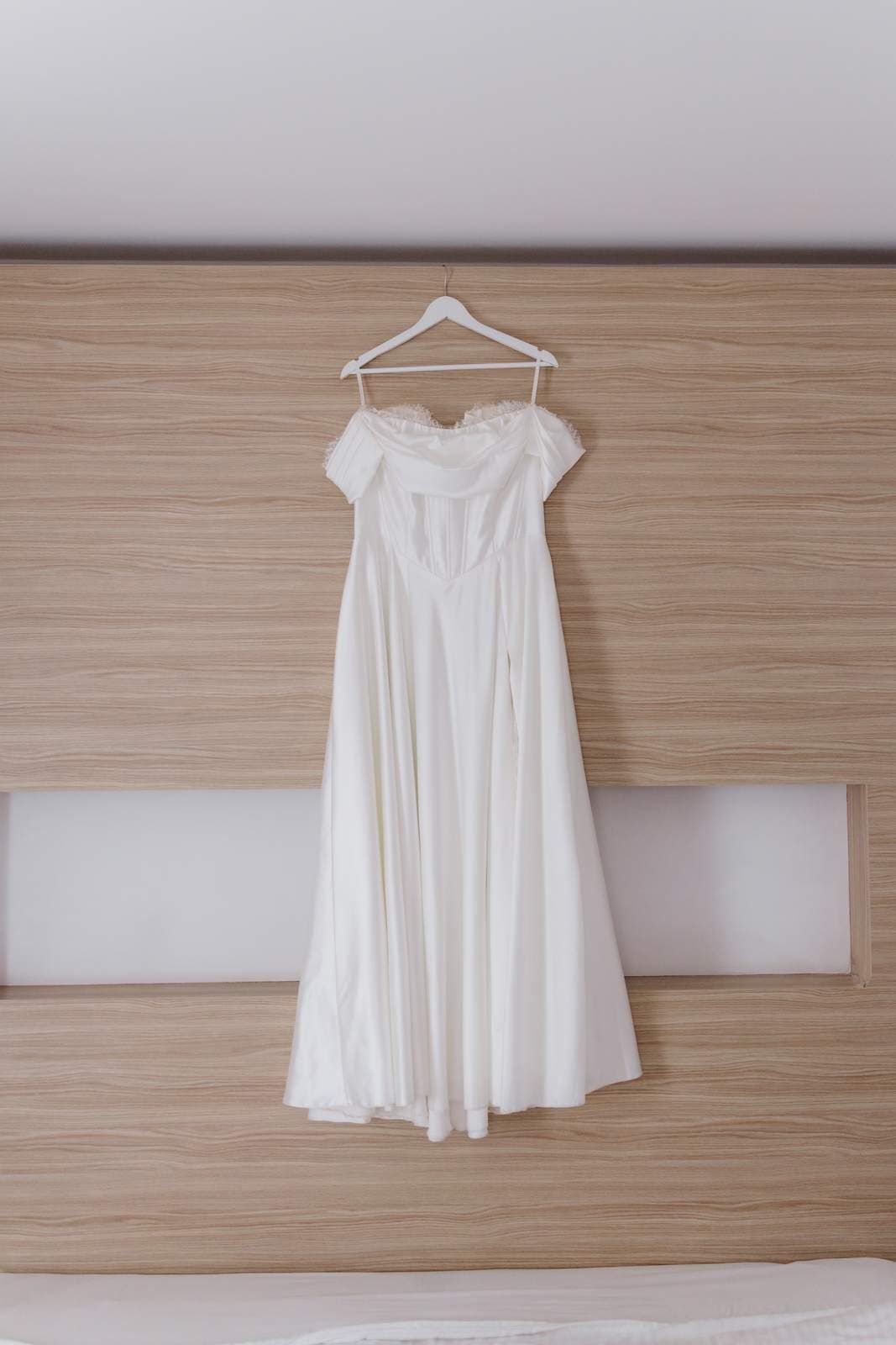 Sivan & Elon, the wedding dress hanging