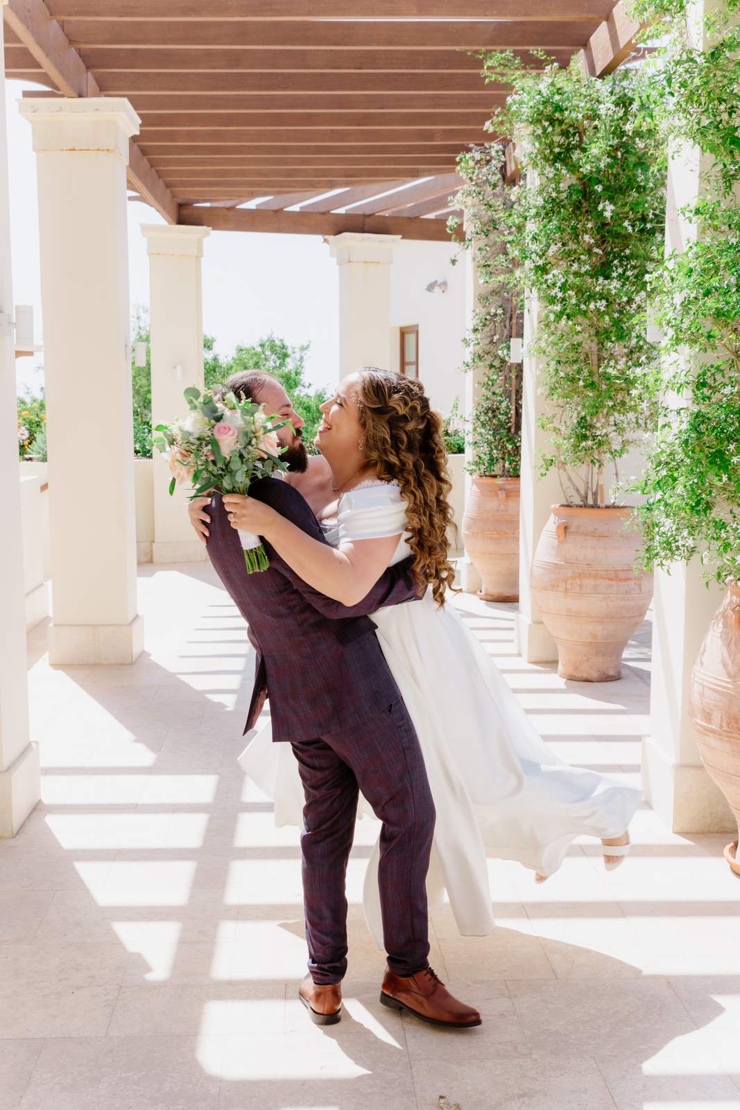 Sivan & Elon, a twirl under the pergola