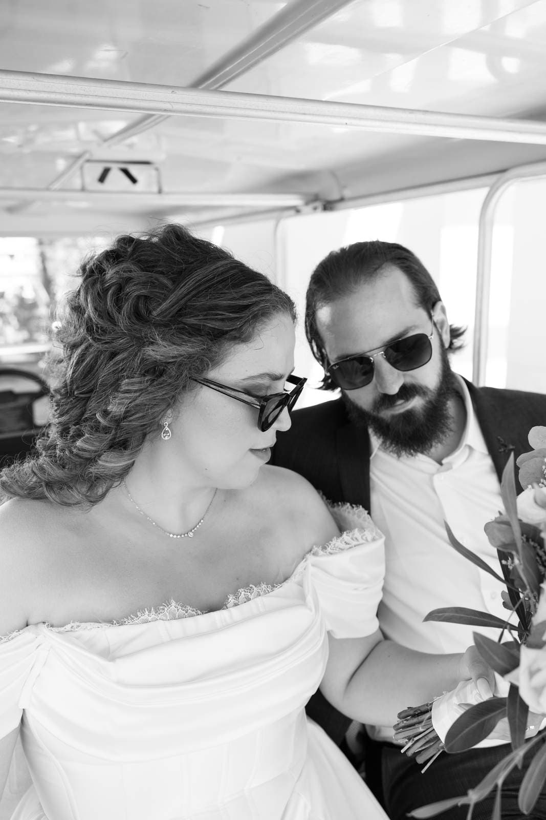 Sivan & Elon, the golf cart ride, in black and white