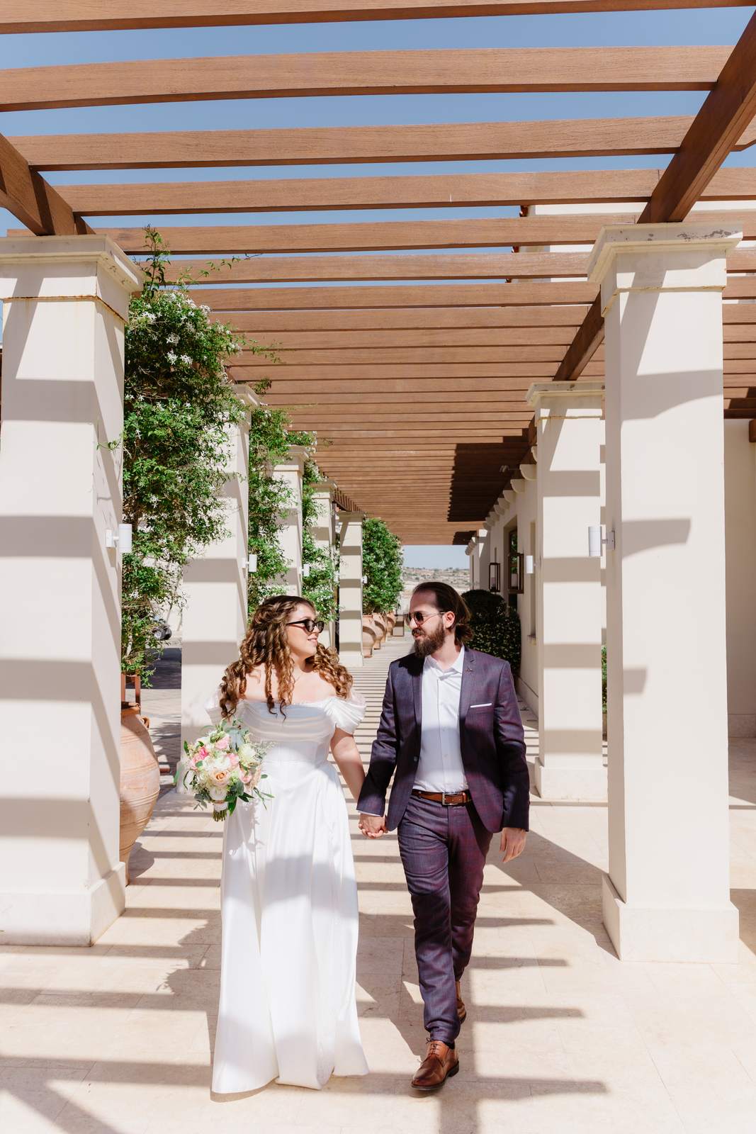 Sivan & Elon, walking along the colonnade