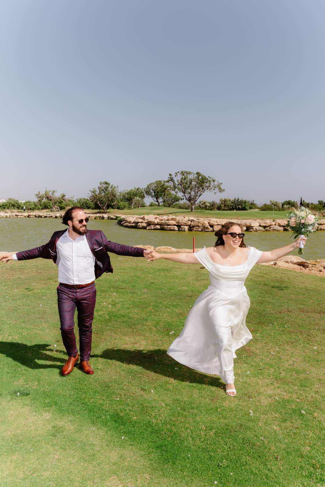 Sivan & Elon, running hand in hand across the green