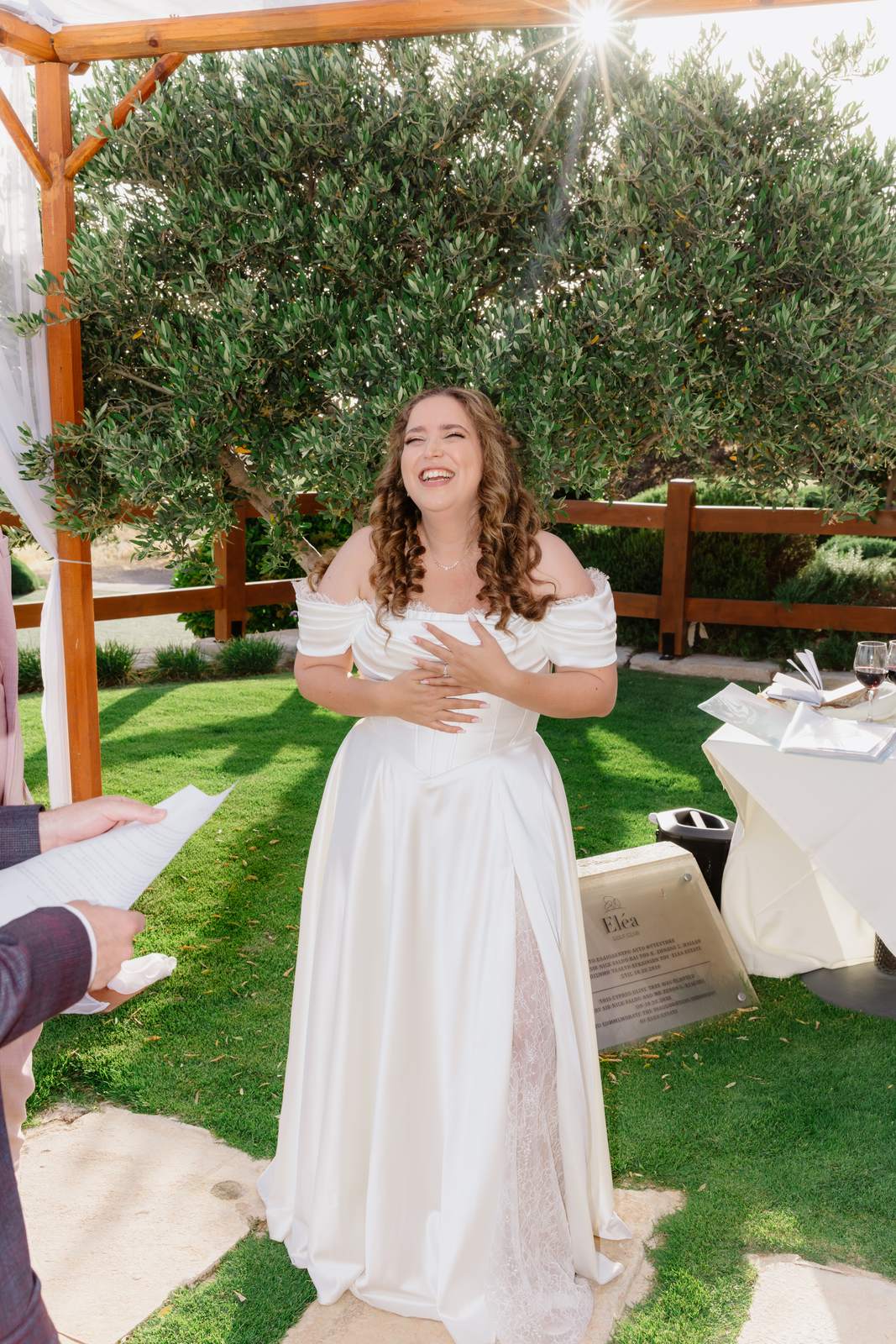 Sivan & Elon, the bride laughing, in black and white