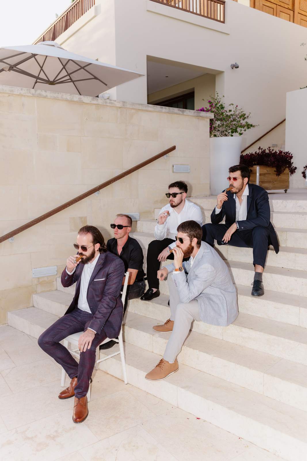 Sivan & Elon, the groom and his friends on the steps