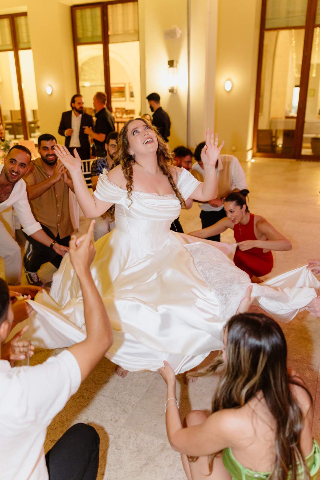 Sivan & Elon, the bride lifted by her friends